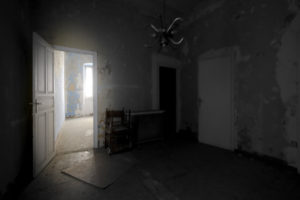 interior of an apartment with abandoned walls, ceilings and floors in the center of a European city interior of an apartment with abandoned walls, ceilings and floors in the center of a European city